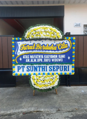 Papan Bunga Duka di Bilah Barat