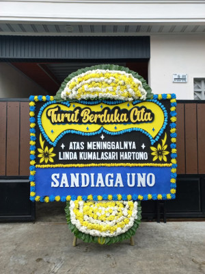 Papan Bunga Duka di Bilah Barat