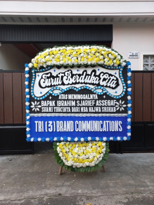 Papan Bunga Duka di Bilah Barat